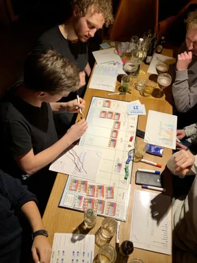 People sharing table for vision-care, fashion, and fun board game