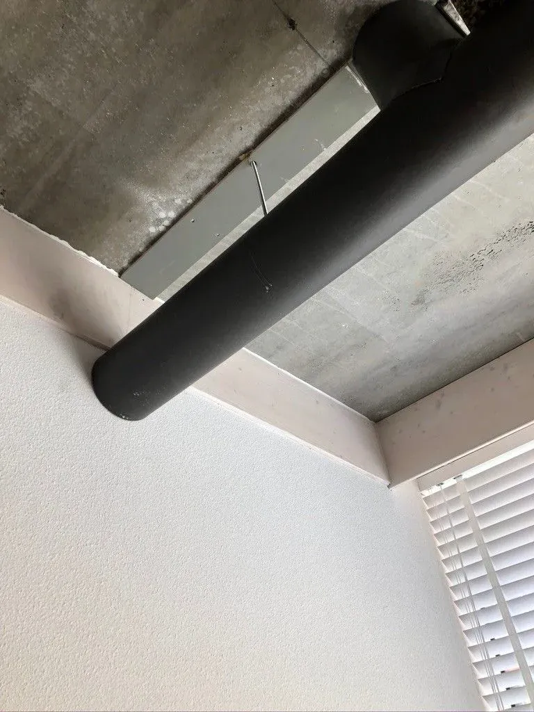

Modern wood & composite beam fixture w/ geometric tints & shades.