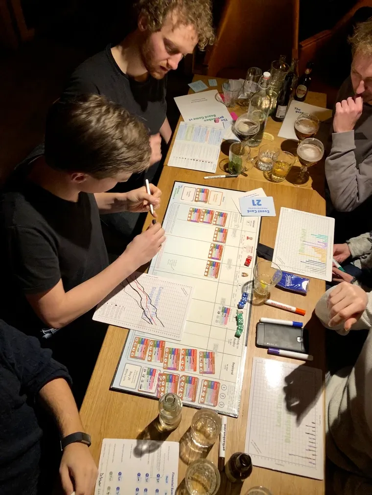 

People sharing table for vision-care, fashion, and fun board game